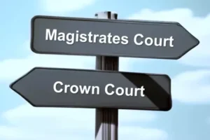 A signpost to the magistrates court and to the crown court.